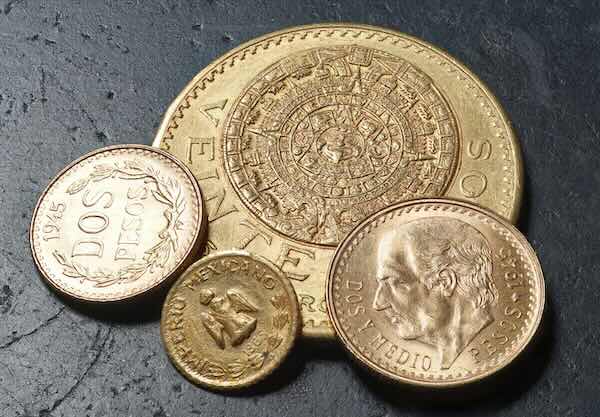 Stack of Mexican Gold Pesos Coins including Veinte, Dos, Uno, Cinco